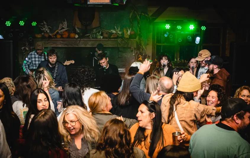 A dance party ensues from the live music.