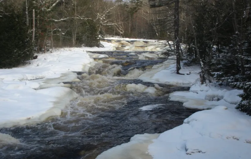 A cascading part of a river in the winter