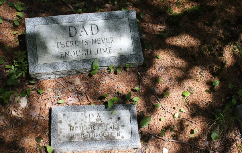 A couple gravestones