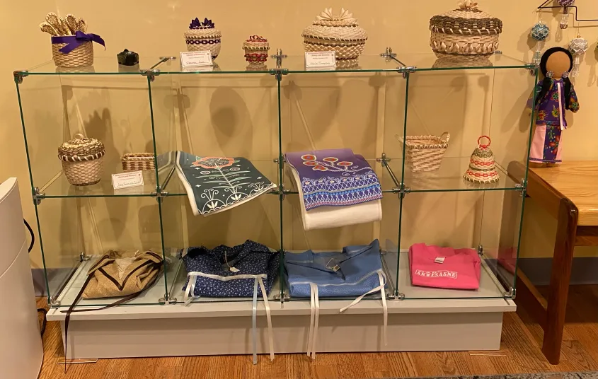 A glass display with items at the Akwesasne Cultural Center