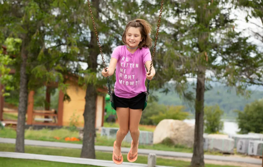 There are three age appropriate swinging areas.