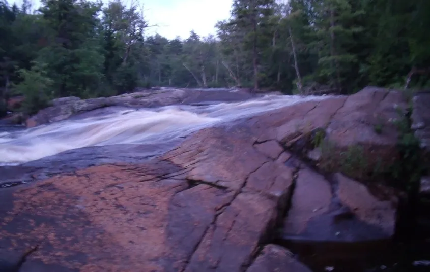 A smooth flowing waterfall over rocks
