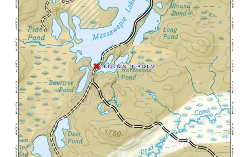 A map with a red marker showing where a parking area is.