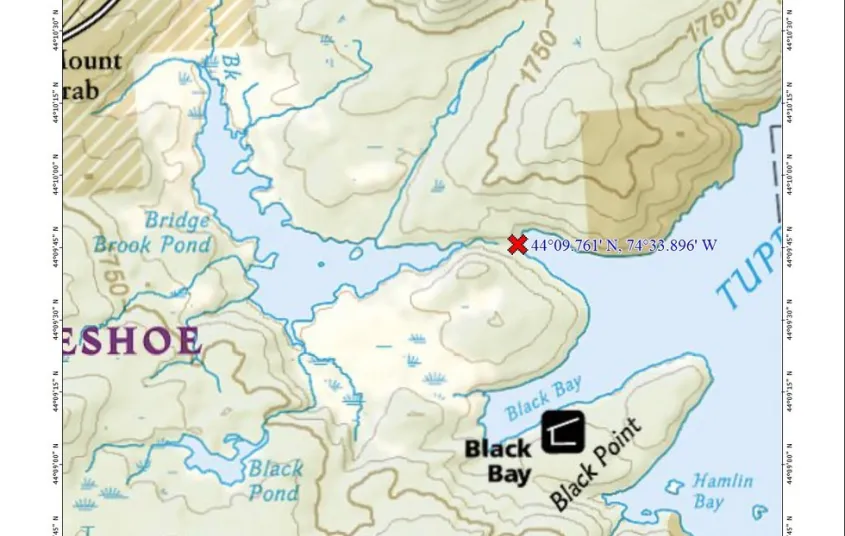 A map showing a red x for a carry to another pond
