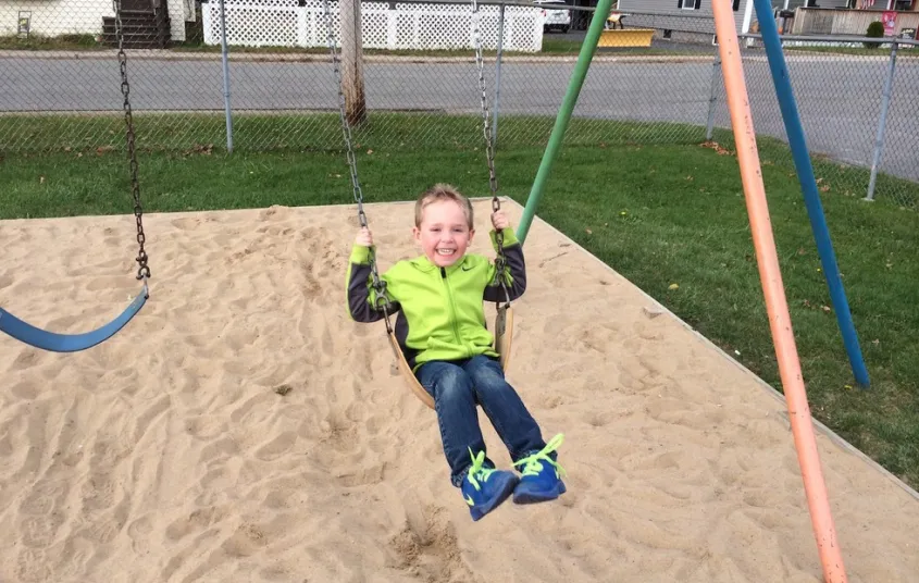 Washington Street Park has 4 swings and 5 slides.
