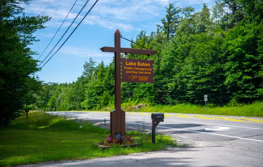 The wooden sign for Lake Eaton Campground