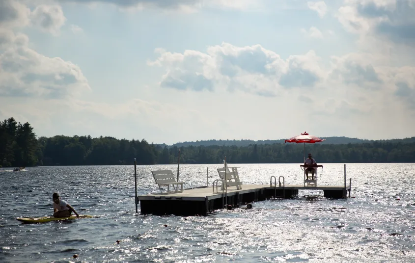A dock with chairs on it