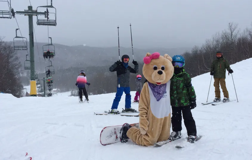 Someone in a teddy bear costume at Titus Mountain