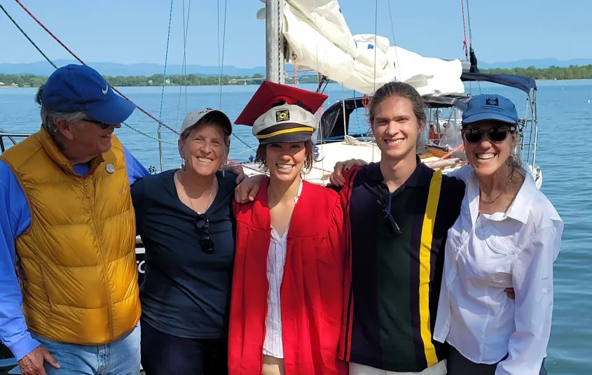 People taking a photo on a sailboat