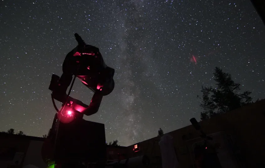 A comet streaks across the night sky