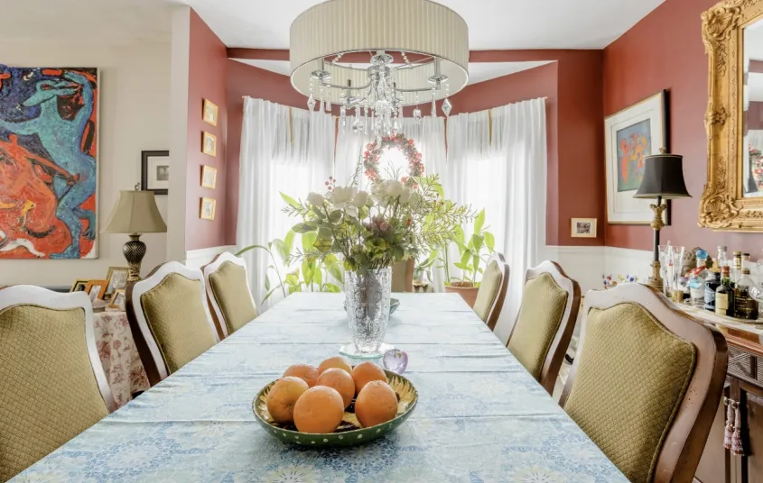  over-sided chair and many cozy throw pillows.