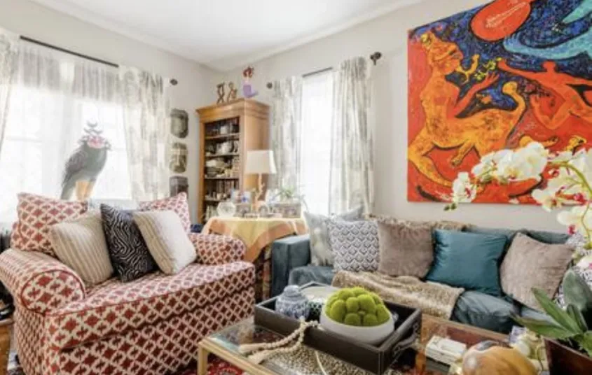 A sitting room with large couch