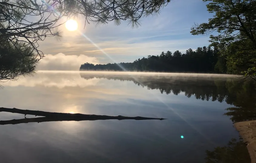 The screened porch and stone walk way at Rockledge Cabins & Retreats 
