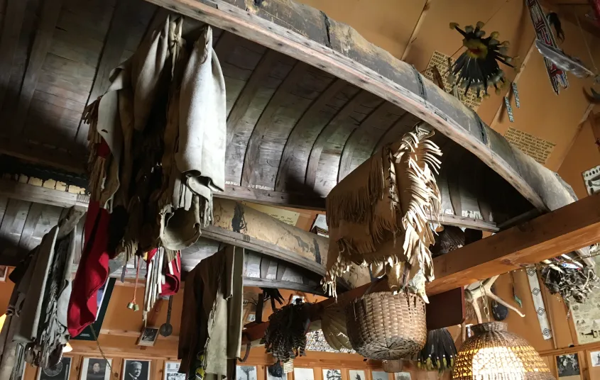 Boats hang from the ceiling