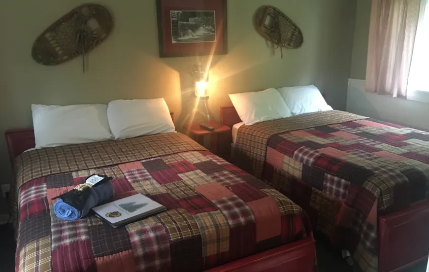  A room with two queen beds