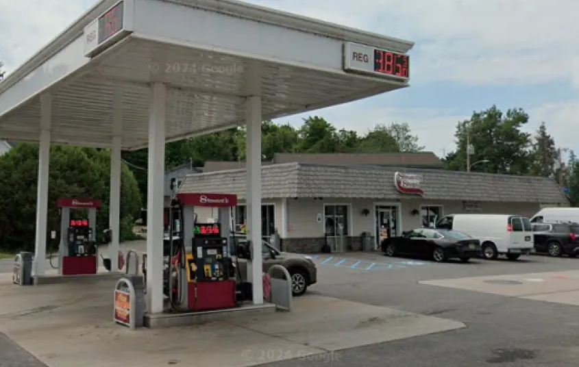The road side view of Stewart's Shops in Tupper Lake with gas pumps and ample parking.