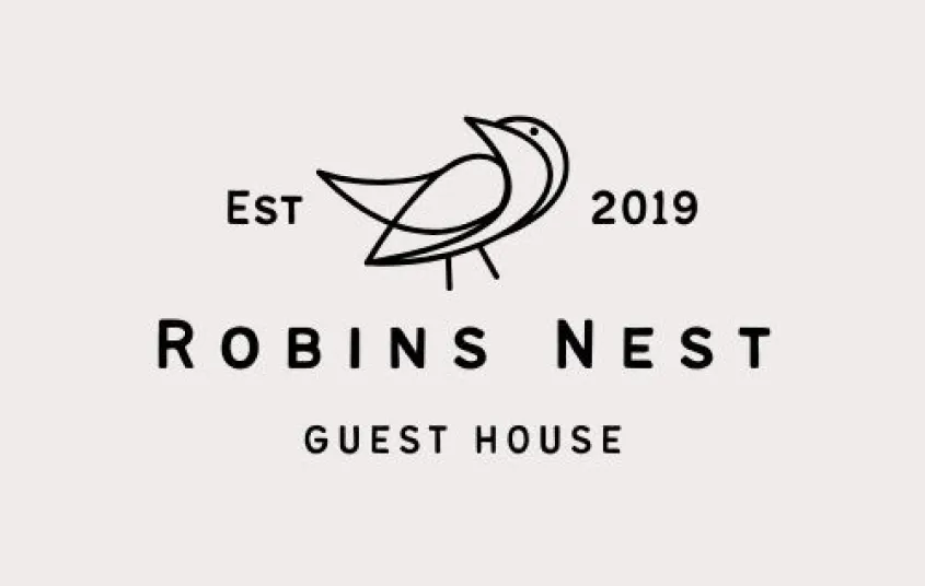 A line illustration of a bird surrounded with the text 'Est 2019 Robins Nest Guest House'.