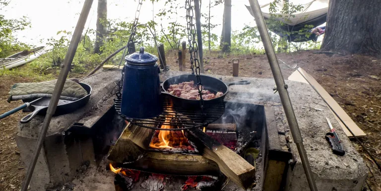 Sling a hammock waterside while the food cooks over the fire pit.