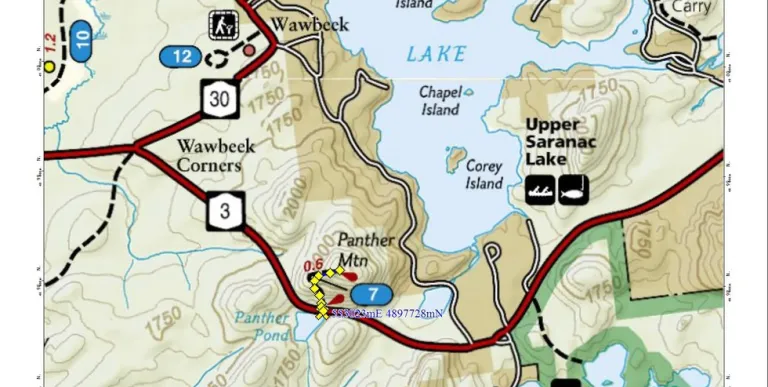 A map with a hiking trail and larger lake