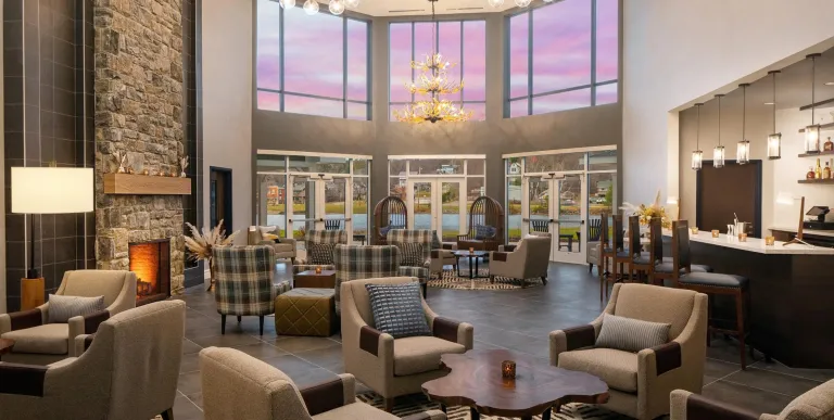 Grand loby space with stone fireplace