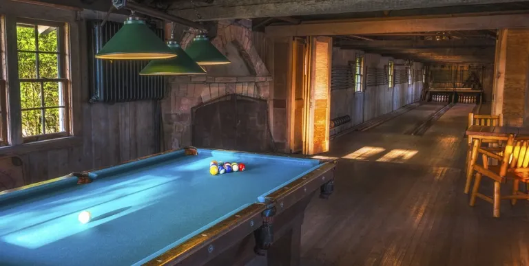 A Green building and white trim of Mrs Coolidge