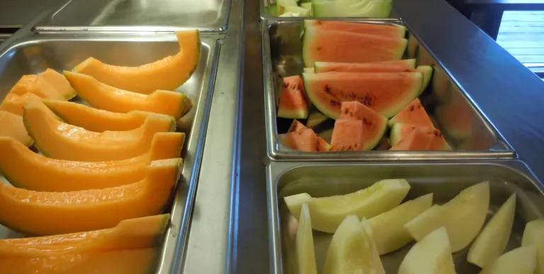 Sliced melons on display