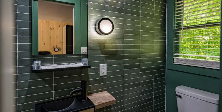 Emerald green tiles with white grout