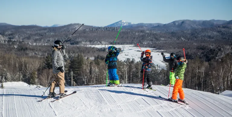 A group of skiers on top of Mount Pisgah