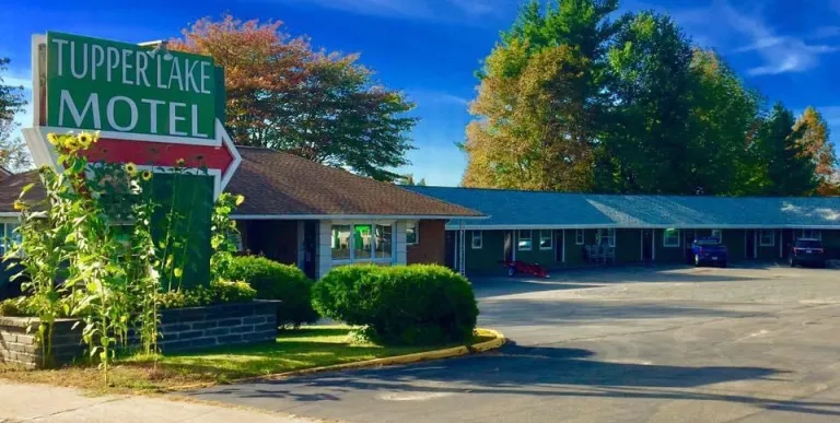 Entry way to the Tupper Lake Motel and the parking area.
