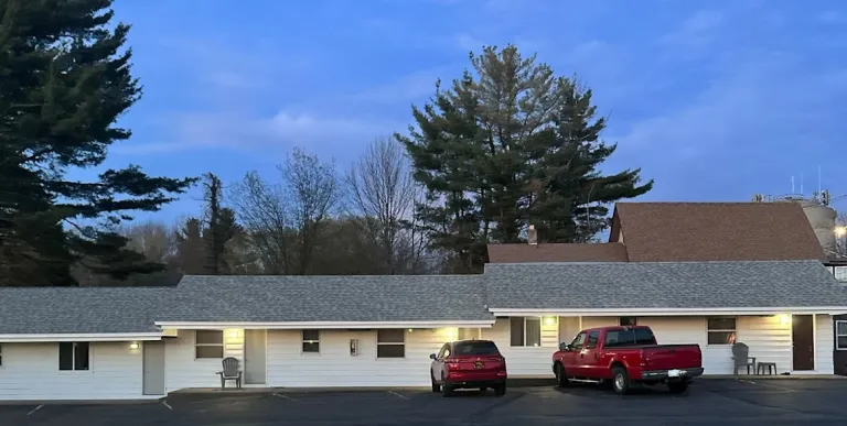 The exterior of the white motel.