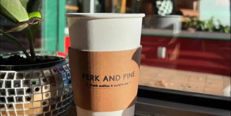  walls full of shelves with shirts and sweatshirts