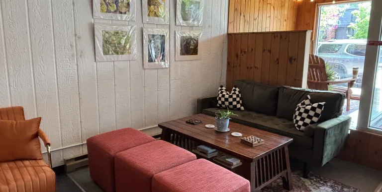 The front counter with extensive menu hanging above