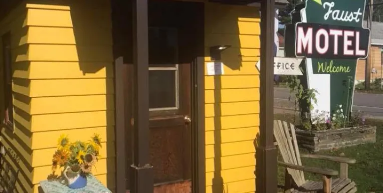 A small cabin with yellow walls