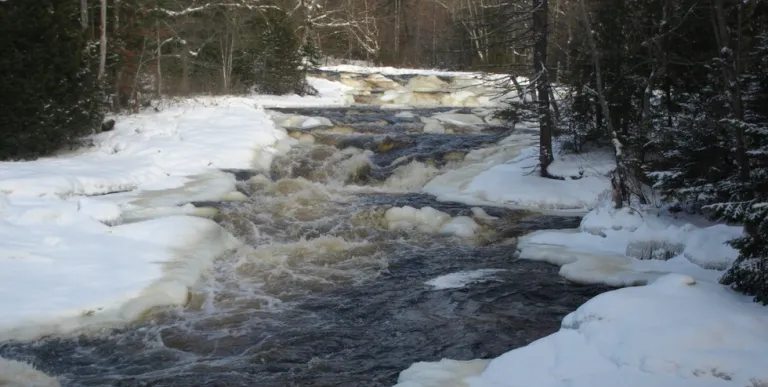 A cascading part of a river in the winter