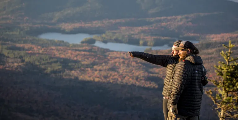 The best views are from an open rock ledge just beyond the summit.