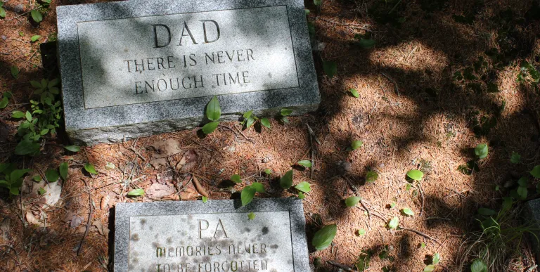 A couple gravestones