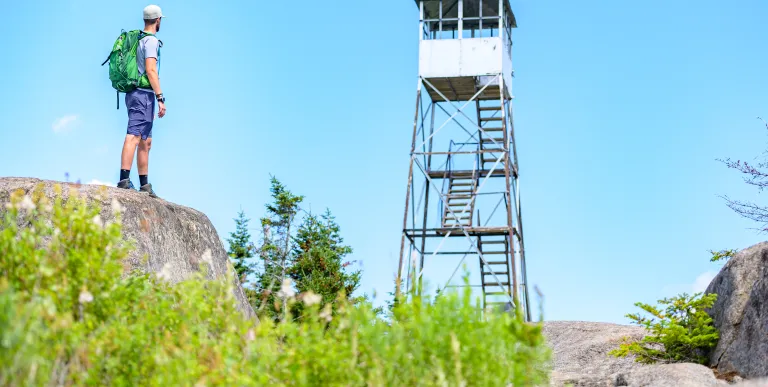 A man below a firetower