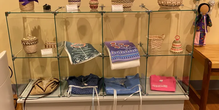 A glass display with items at the Akwesasne Cultural Center