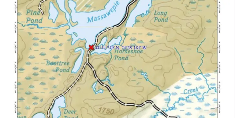 A map with a red marker showing where a parking area is.