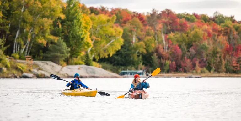 A couple kayakers in the fall