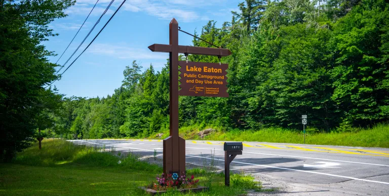 The wooden sign for Lake Eaton Campground