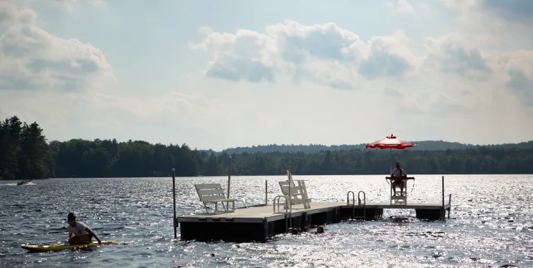 A dock with chairs on it
