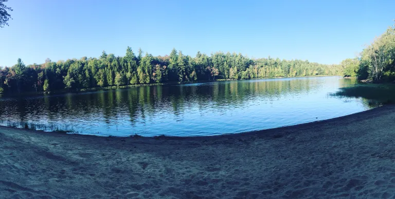 This sandy beach on the Raquette River has everything for a great day at the beach.