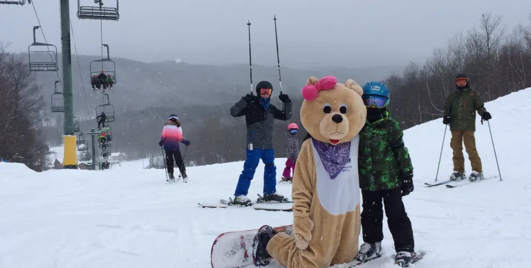 Someone in a teddy bear costume at Titus Mountain