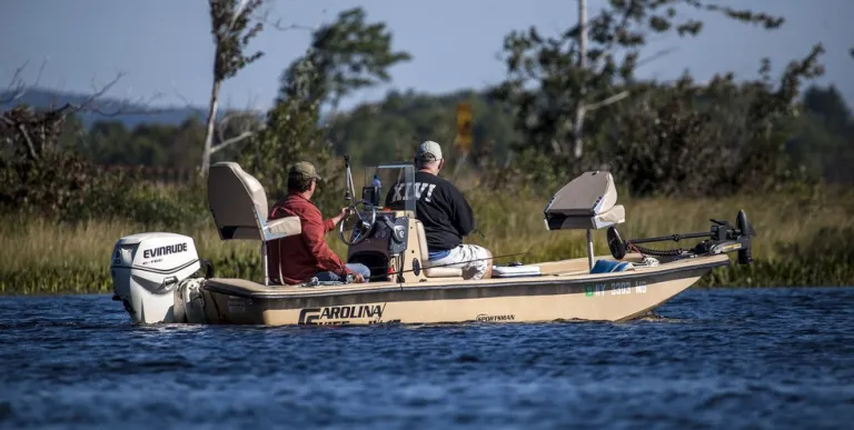 People on a motorboat in Simon Pond