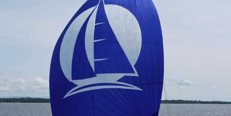Blue sail on sailboat