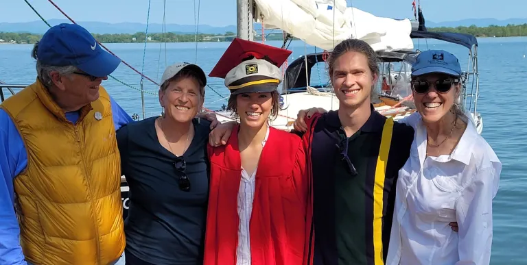 People taking a photo on a sailboat