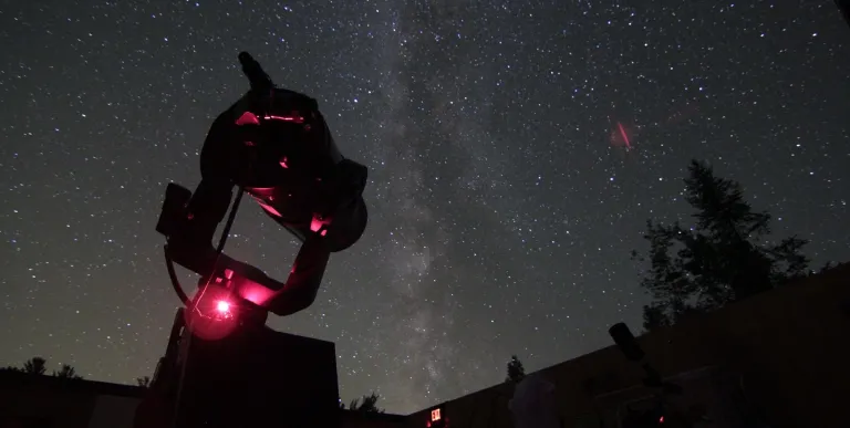 A comet streaks across the night sky