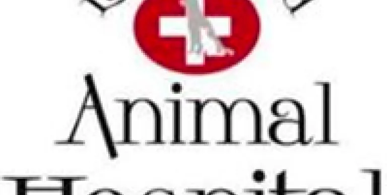 Lake Placid Animal Hospital logo of red circle with white cross and grey dog silhouette in center.