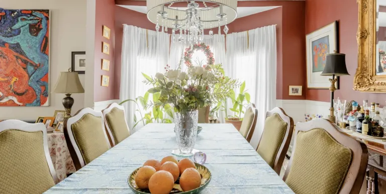  over-sided chair and many cozy throw pillows.